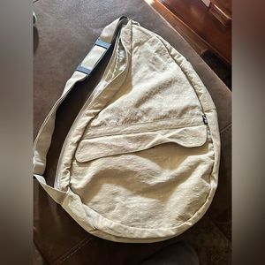 Ameribag. Never used. Approximately 22”x14”x7”. One strap. Beige.